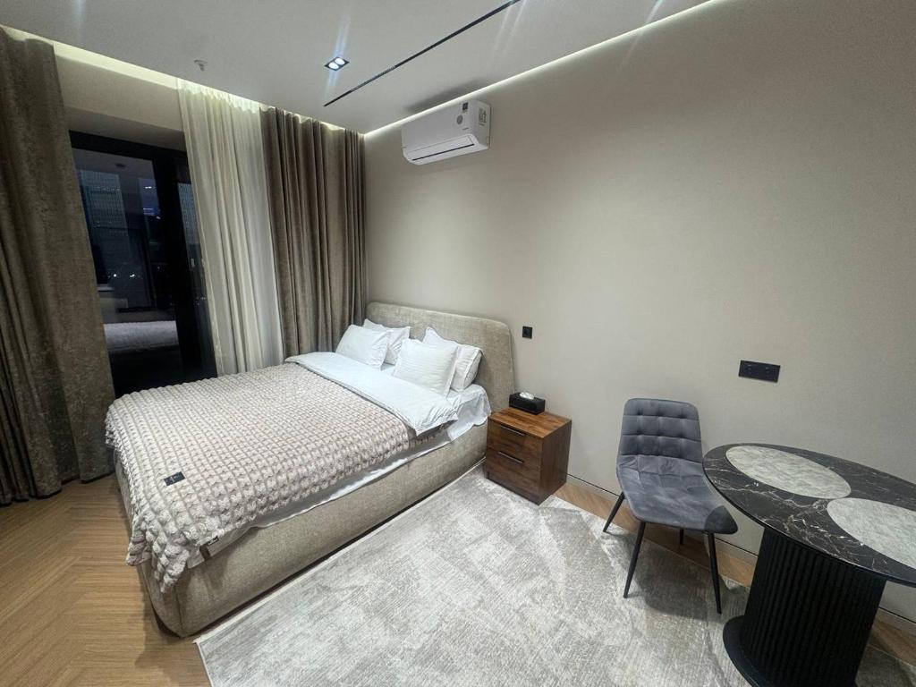 تصویر اتاق‌های U Tower rental apart-studio Tashkent city view, Magic City, City Mall - تصویر ۲