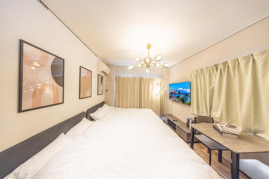 Within a 10-min direct connection to Shinjuku, 3-min walk from Nogata Station, Right in front of the shopping street, 2 double beds, can accommodate up to 4 guests #203