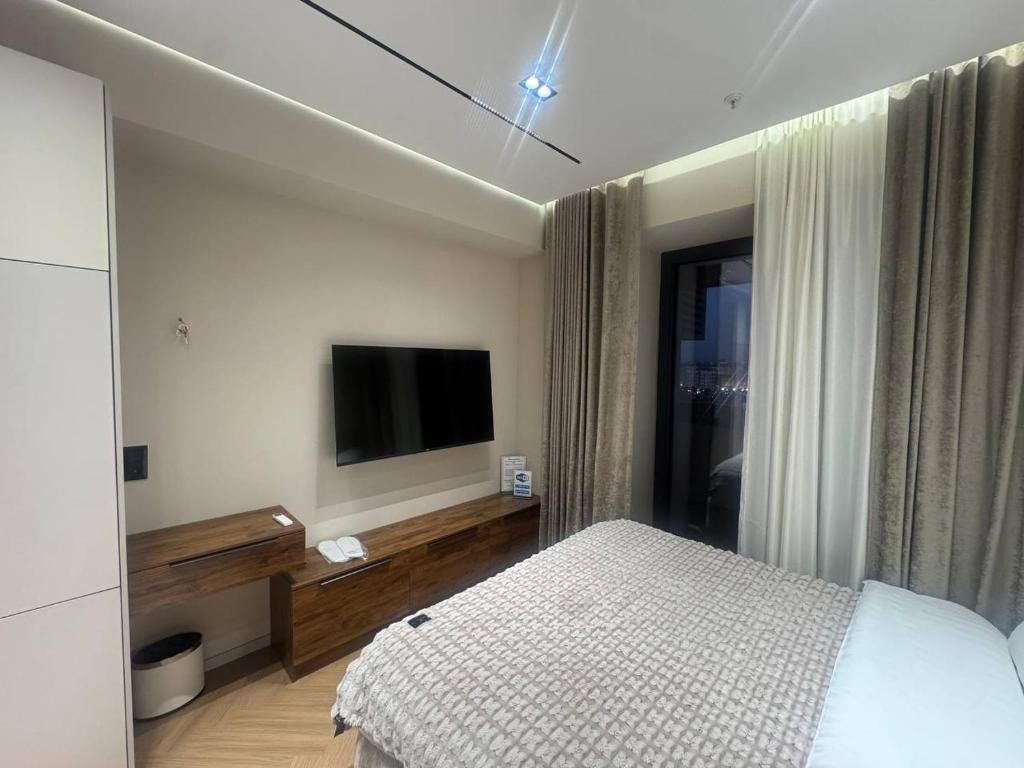 فضای داخلی U Tower rental apart-studio Tashkent city view, Magic City, City Mall در تاشکند - تصویر ۳
