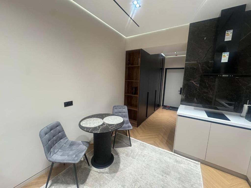 لابی و فضای عمومی U Tower rental apart-studio Tashkent city view, Magic City, City Mall - تصویر ۵