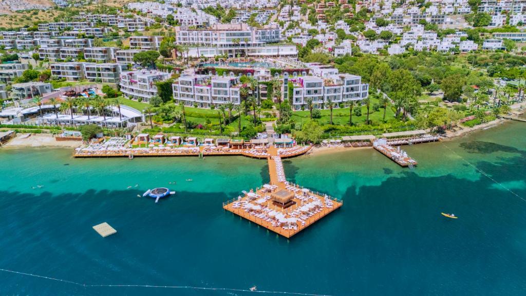 an aerial view of a resort on the water at Baia Bodrum Hotel in Gundogan