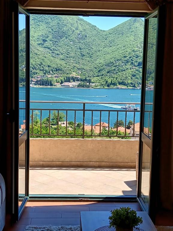 a view of the water from a balcony at Apart Capital FISA Kamenari in Kamenari