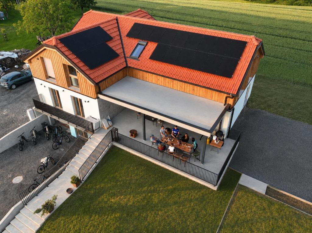 an overhead view of a house with people on the balcony at Vila Mill in Sveti Jurij ob Ščavnici