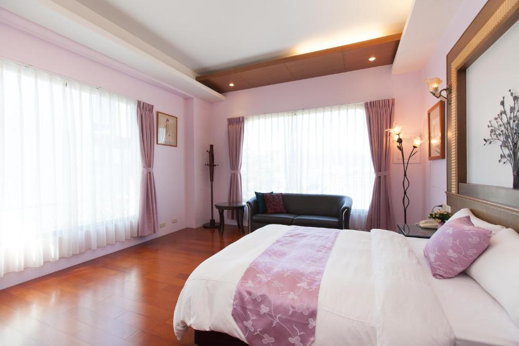 Postel nebo postele na pokoji v ubytování Chun Feng Cao Tang Homestay