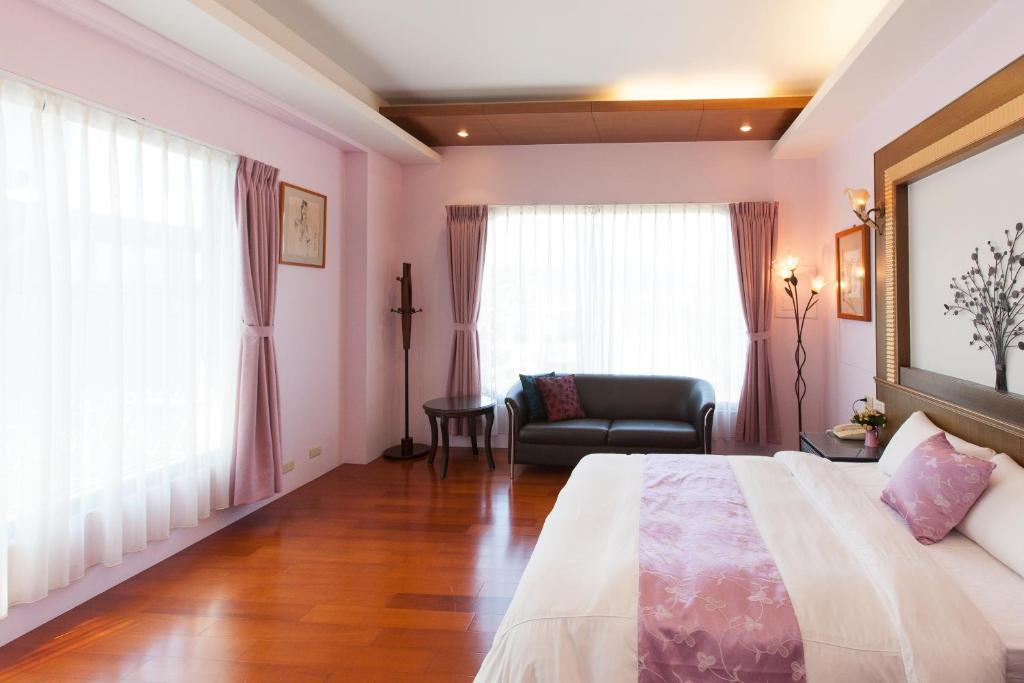 Postel nebo postele na pokoji v ubytování Chun Feng Cao Tang Homestay