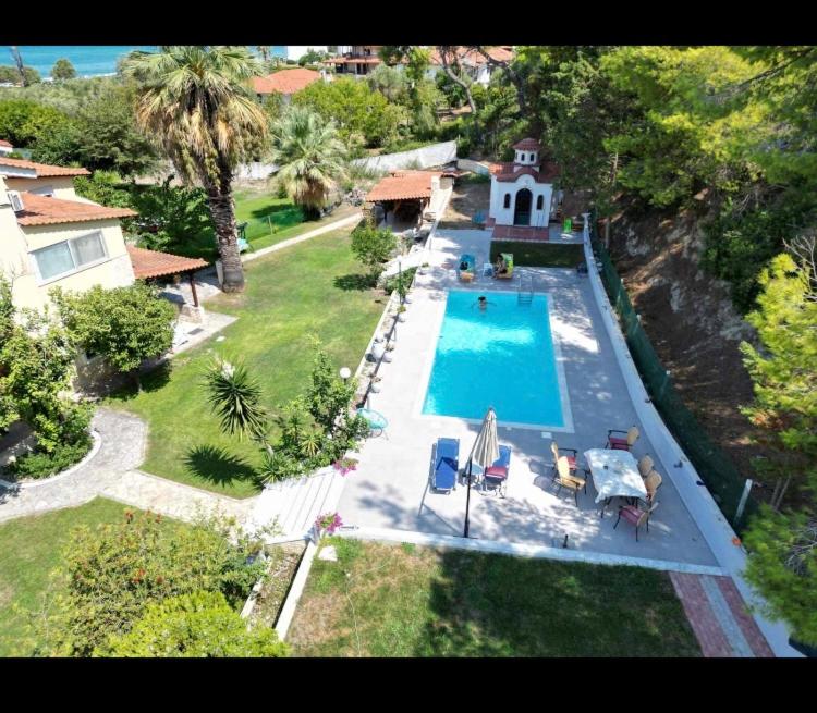 an overhead view of a swimming pool in a house at Posidi pool apartment in Possidi