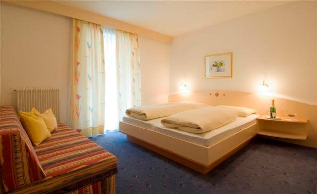 Postel nebo postele na pokoji v ubytování Residence Königsrainer