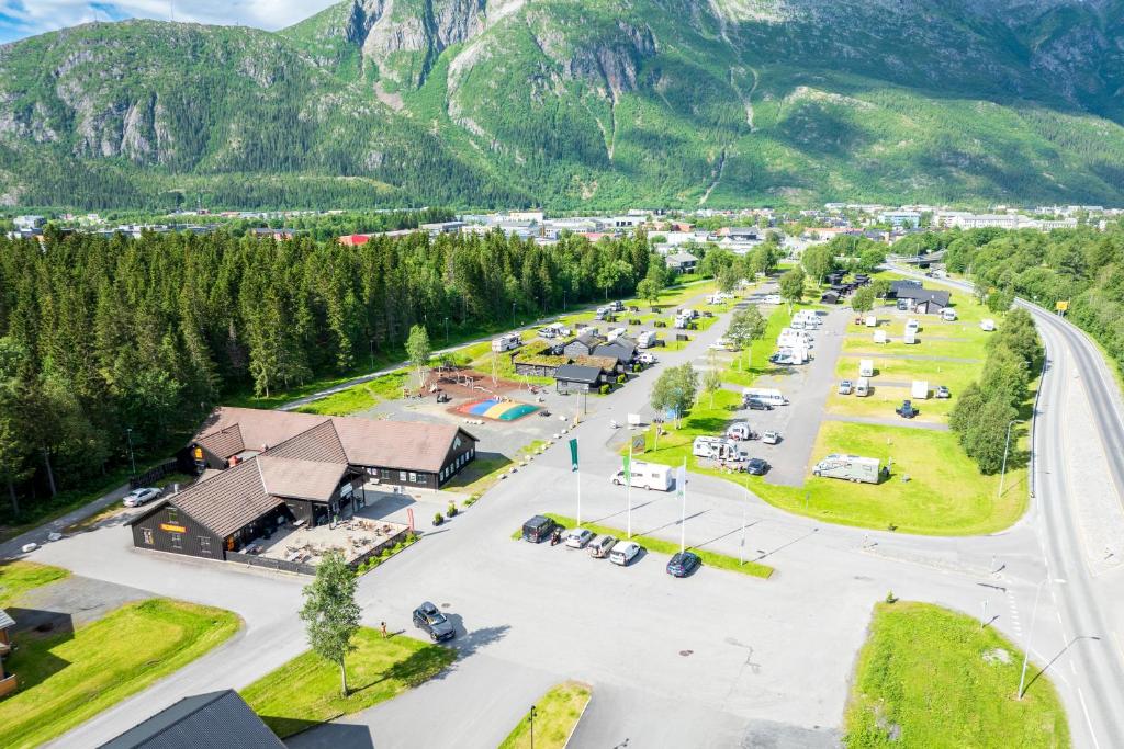 an aerial view of a parking lot in the mountains at Topcamp Mosjøen - Helgeland in Mosjøen
