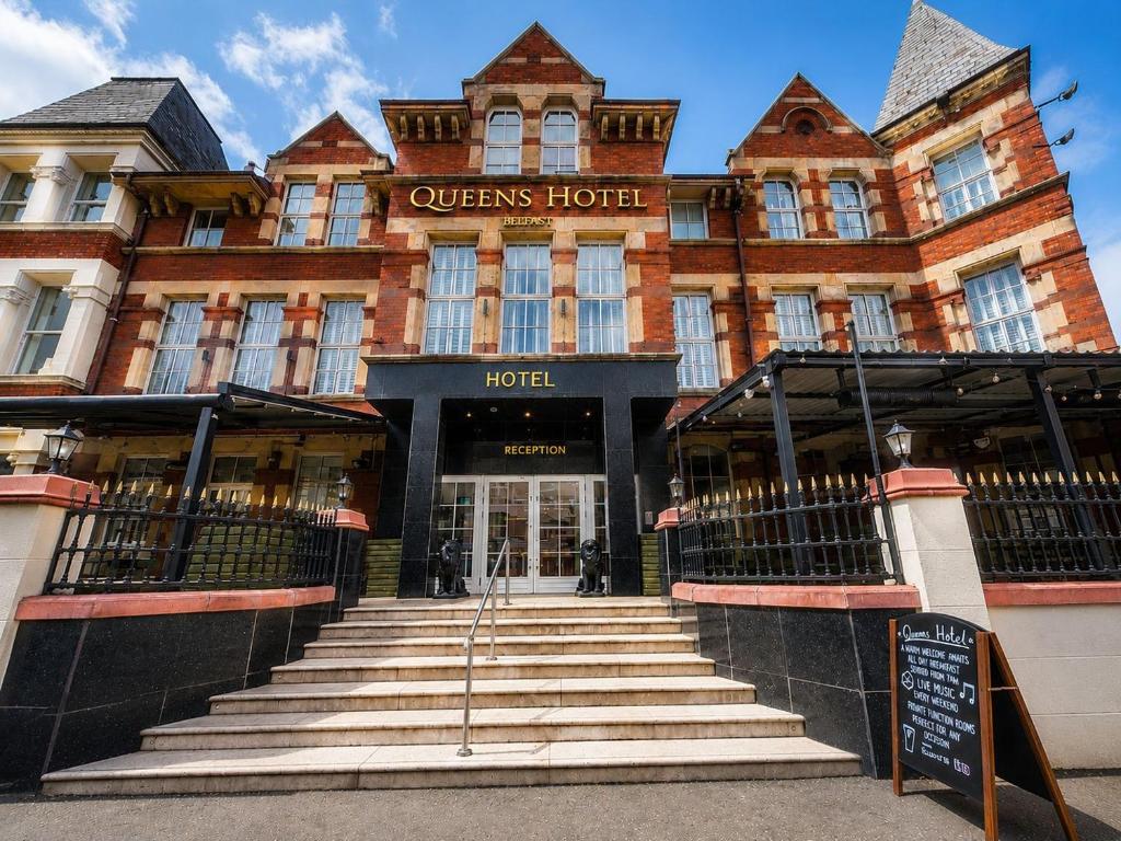 a building with stairs leading to a hotel at Queens Hotel Belfast in Belfast