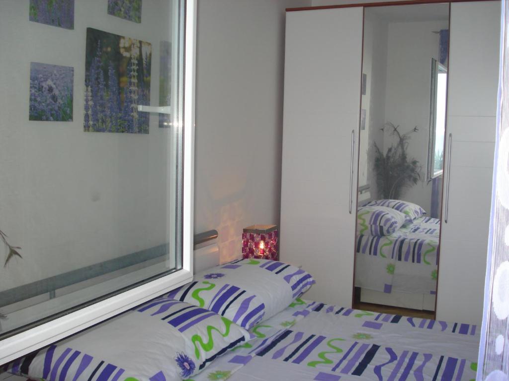 Postel nebo postele na pokoji v ubytování Sea Star Apartment