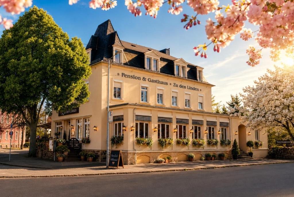 a large white building with a sign in front of it at Pension & Restaurant Zu den Linden Radebeul in Radebeul