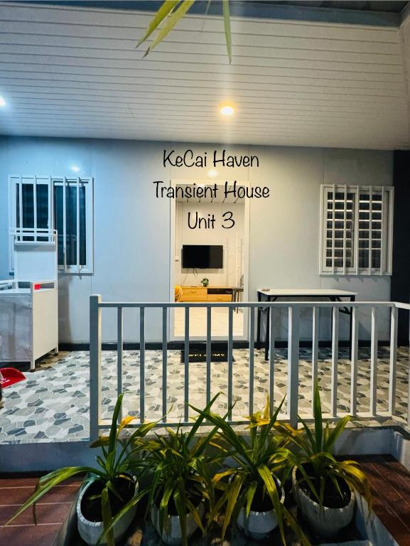 a building with a sign that reads ksecrethaw transient house unit at Kecai Haven Transient House in Digos