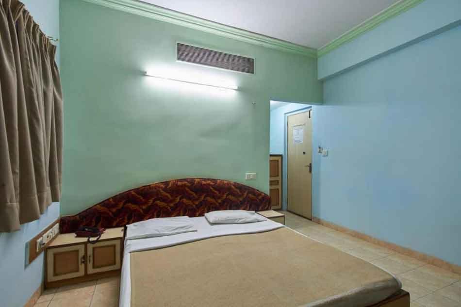 Postel nebo postele na pokoji v ubytování Hotel Damjis