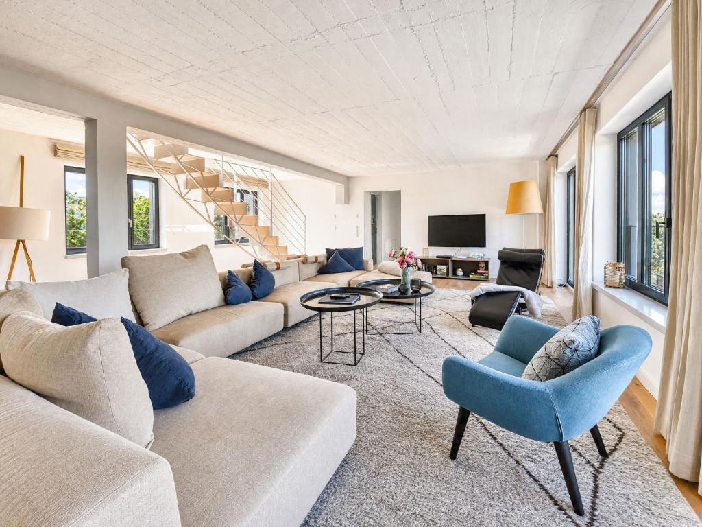 Televizorius ir (arba) pramogų centras apgyvendinimo įstaigoje Ferienwohnung Penthouse 17 im Haus Düne 7 Prora