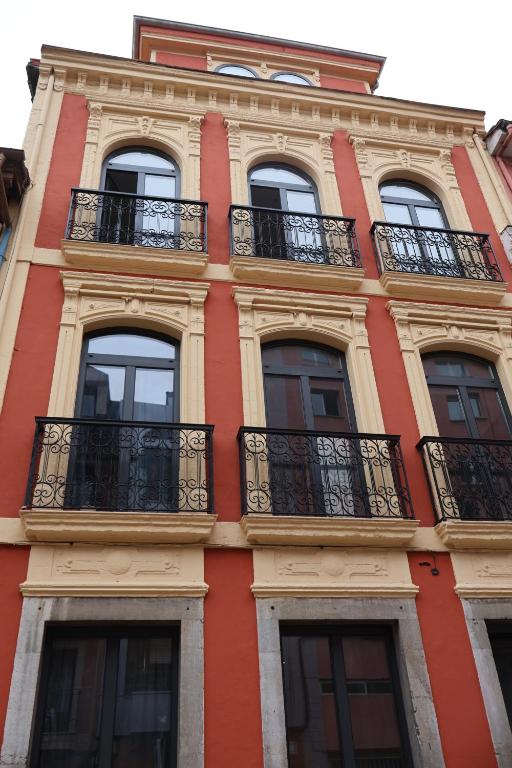 a tall building with balconies on the side of it at MoV Flexliving in Oviedo
