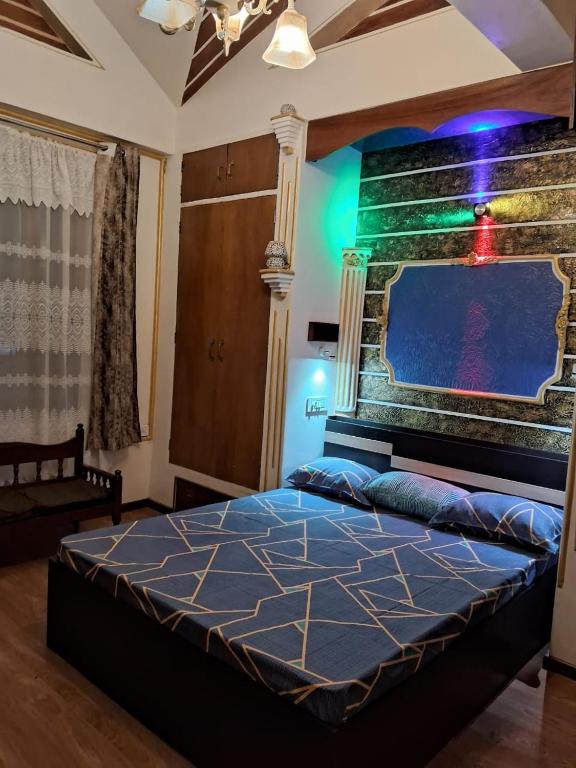 a bedroom with a large bed in a room at Serene Lodge in Shillong