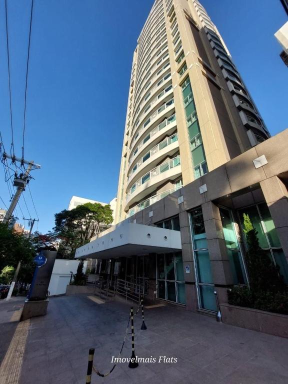a large tall building with a lot of windows at Flat Moderno c/ Vista Próx. PUC, Allianz, Pacaembu in São Paulo