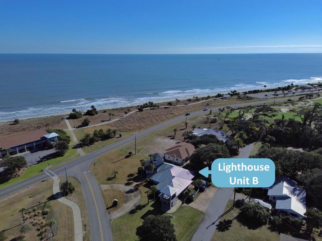 an aerial view of a house with the ocean at Lighthouse Unit B in Jekyll Island