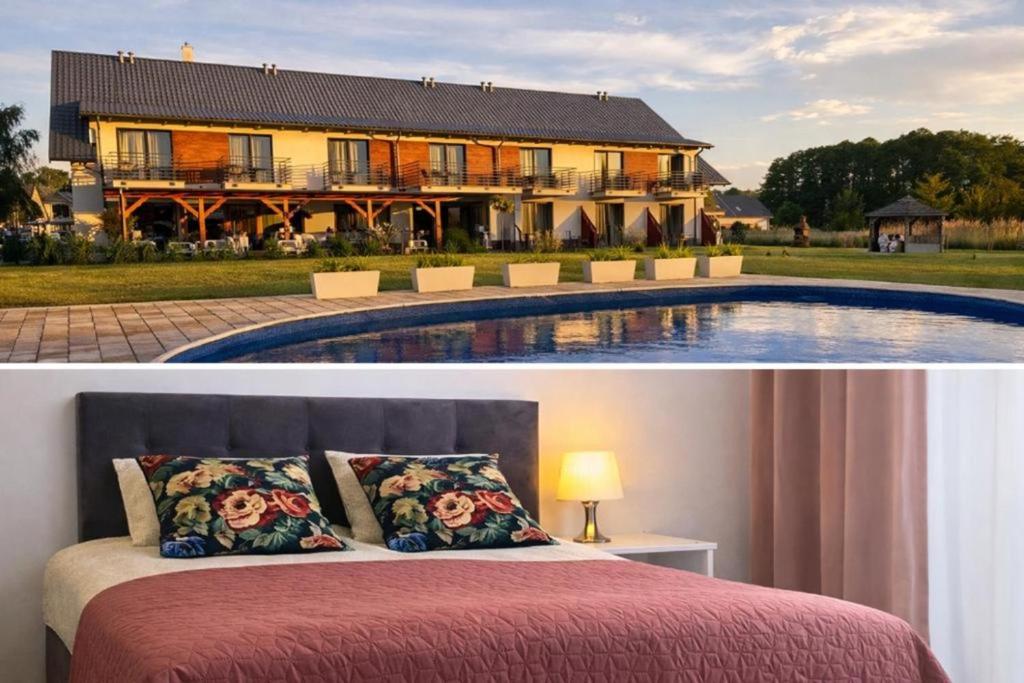 a house and a bed in front of a pool at Pokoje Gościnne Kameralnie in Jantar