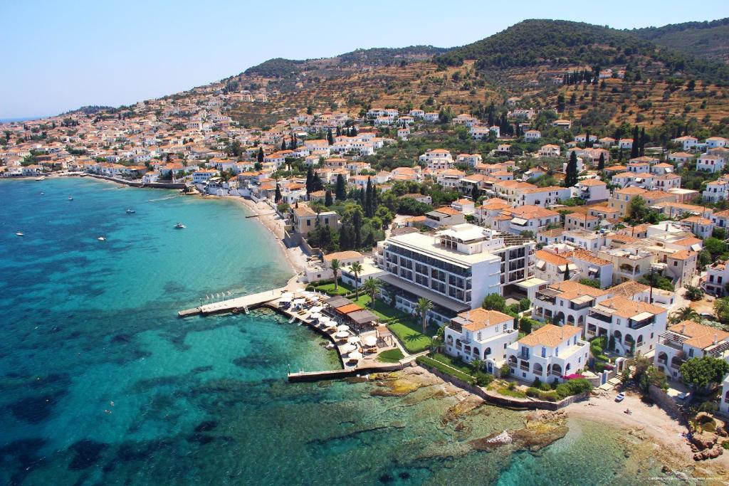 an aerial view of a town next to the ocean at Spetses Hotel in Spetses