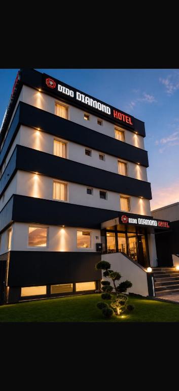 a building with a sign that reads ddb diamond hotel at DiDo Diamond Hotel in Dietzenbach