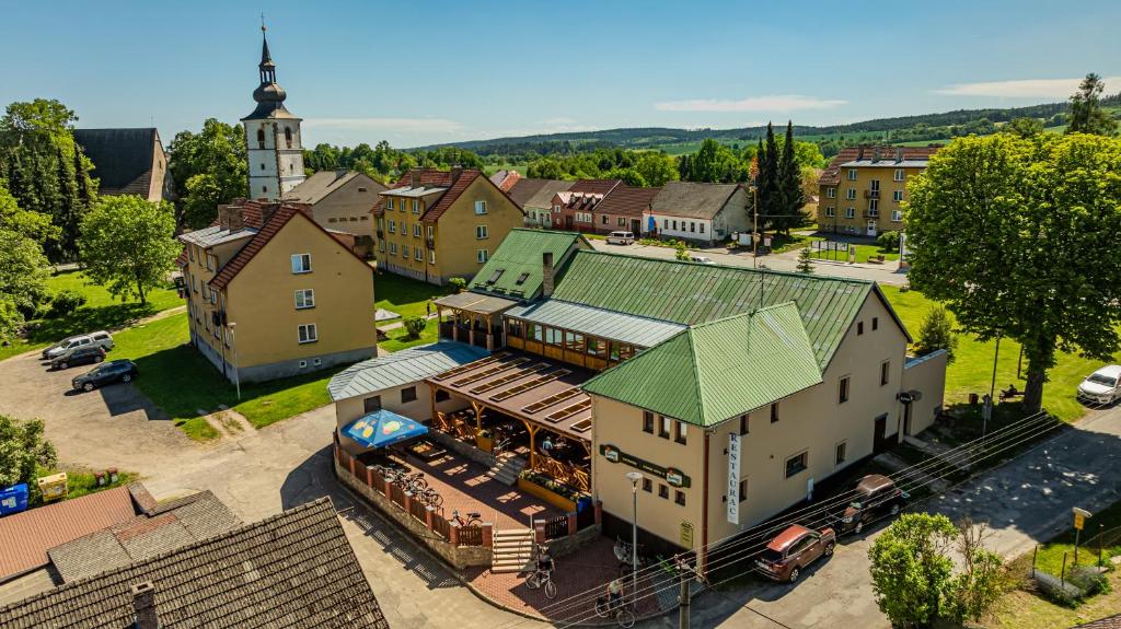 an overhead view of a small town with a train station at Penzion a Restaurace Adria II in Dobrohoř