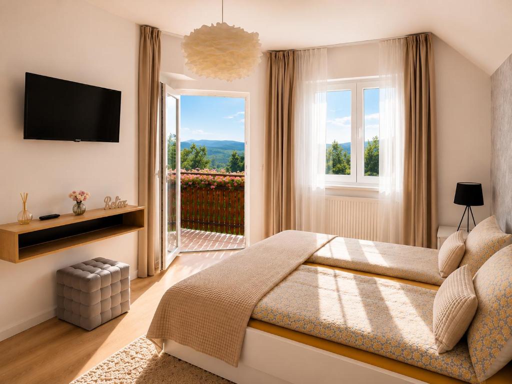 a bedroom with a large bed and a large window at Zen Retreat House Sovata in Sovata
