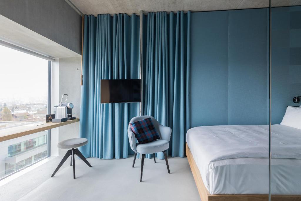 Uma cama ou camas num quarto em Placid Hotel Design & Lifestyle Zurich
