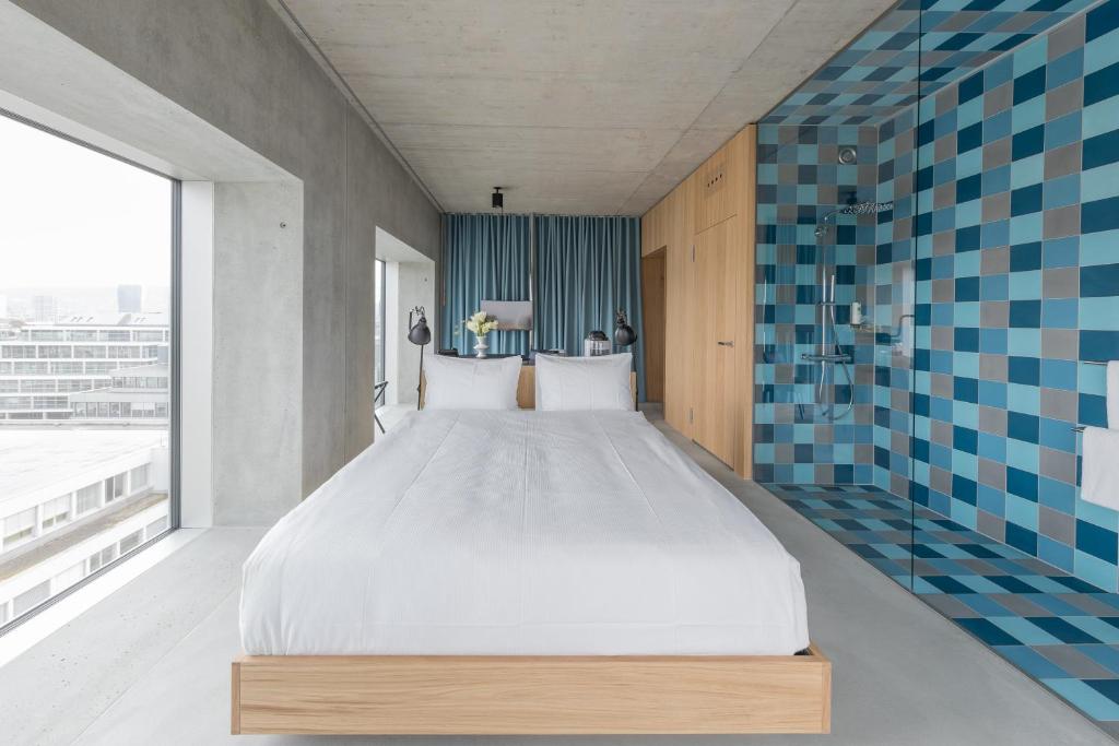 Uma cama ou camas num quarto em Placid Hotel Design & Lifestyle Zurich