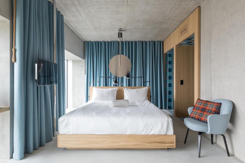 Uma cama ou camas num quarto em Placid Hotel Design & Lifestyle Zurich
