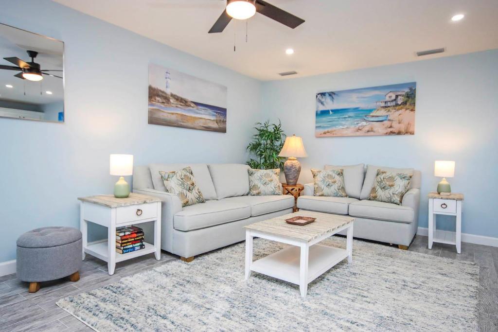 a living room with a couch and a table at Unit D2 in Sanibel