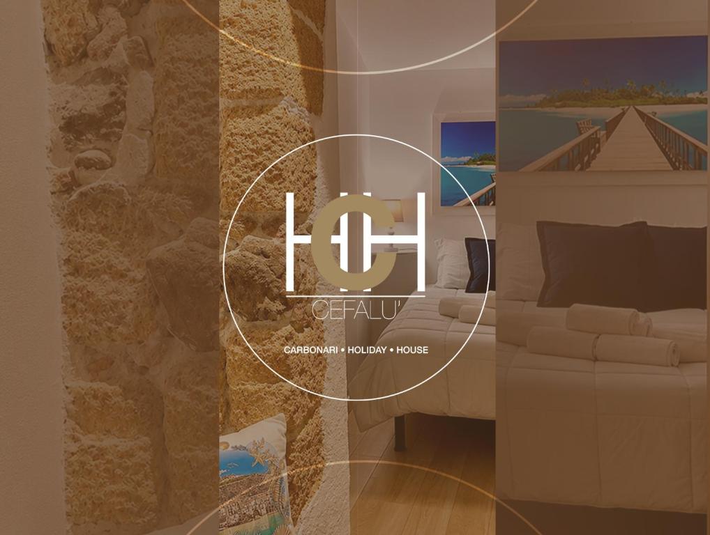 a rendering of a living room with a couch at Carbonari Holiday House in Cefalù