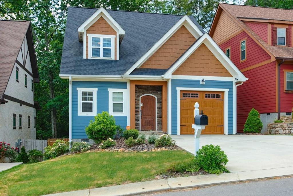a house with a parking meter in front of it at Blue Ridge Haven in Black Mountain