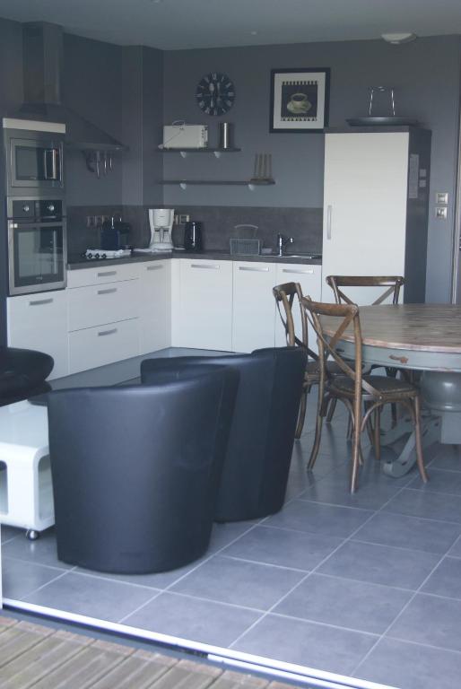 Kuchyň nebo kuchyňský kout v ubytování Residence Kersaliou