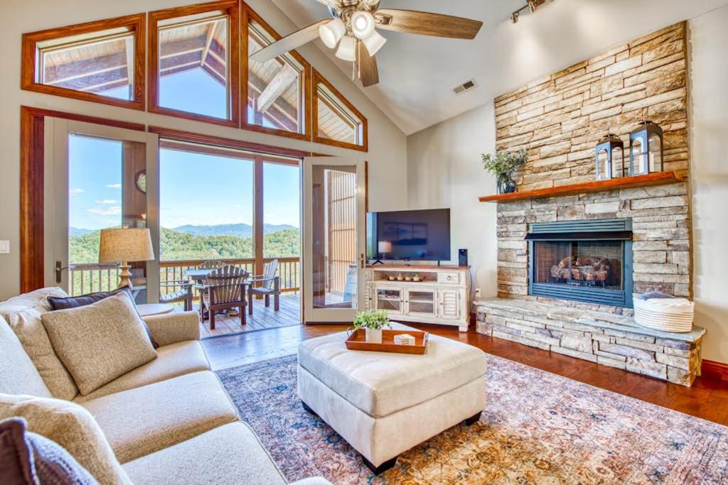 a living room with a couch and a fireplace at Altitude with Gratitude in Whittier