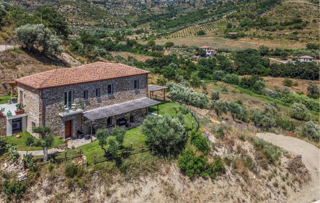 an aerial view of a stone house on a hill at L'antica Pietra in Perdifumo