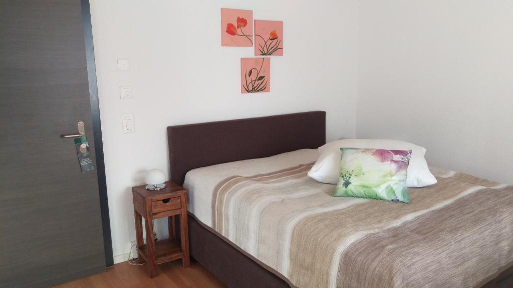 Postel nebo postele na pokoji v ubytování Hotel Enjoy