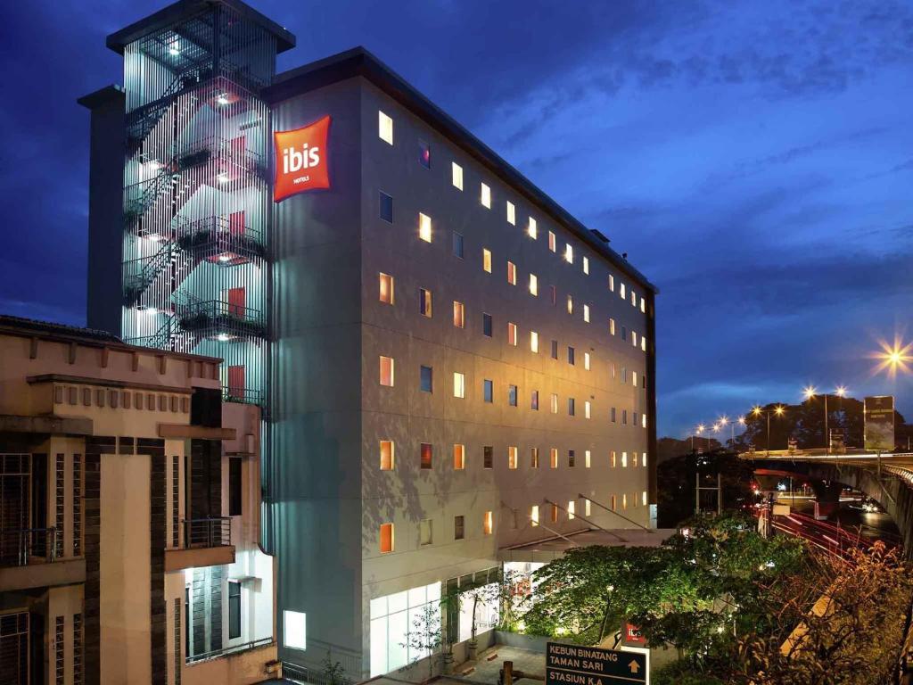 a building with a bbc sign on the side of it at Ibis Bandung Pasteur in Bandung