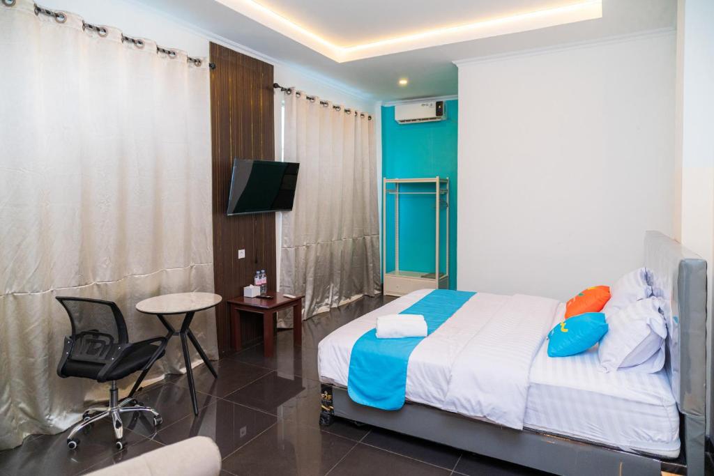 SANS Hotel Bobo Home Jambi - Suite