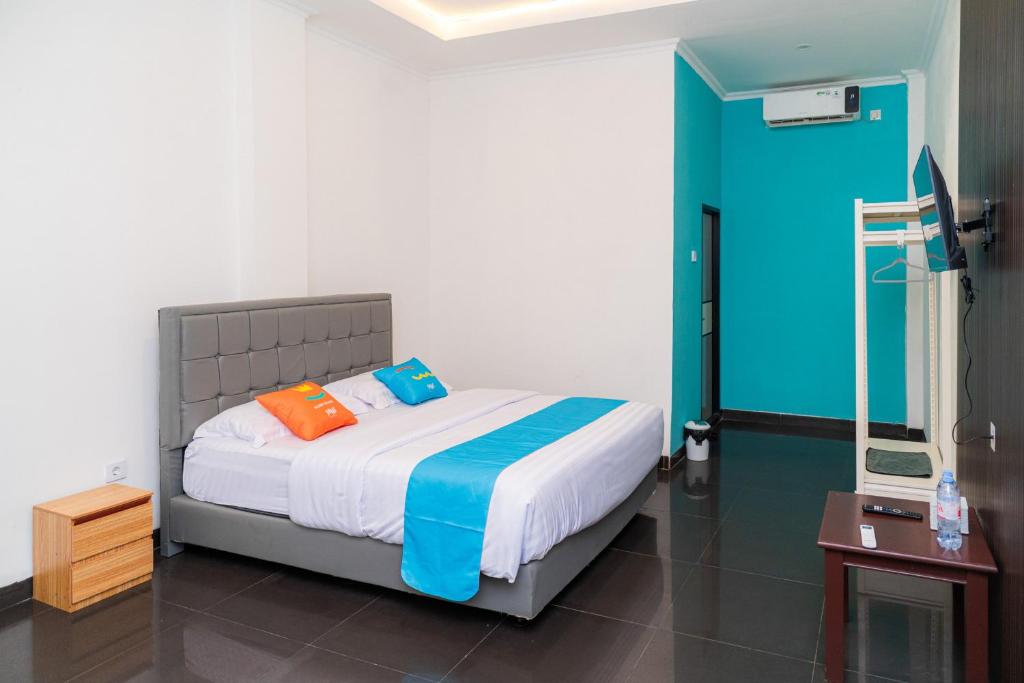 SANS Hotel Bobo Home Jambi - Deluxe Doppelzimmer