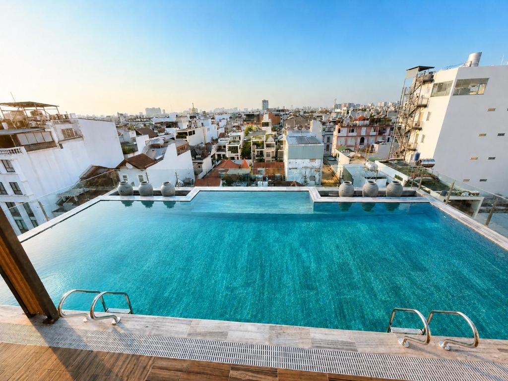 a large swimming pool on the roof of a building at Cherry Airport Hotel and Apartment 2 in Ho Chi Minh City