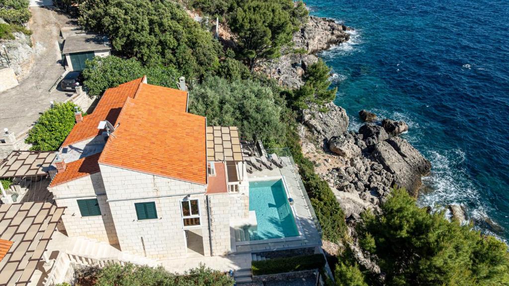 an aerial view of a house next to the ocean at Villa Toma by Villas Guide in Orebić
