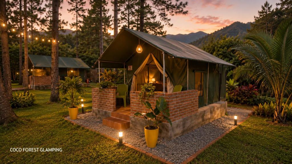 a small house with lights in the yard at COCO FOREST CAMPING - Luxury Glamping & Villa - ONLY FOR FOREIGN BOOKINGS in Kurunegala
