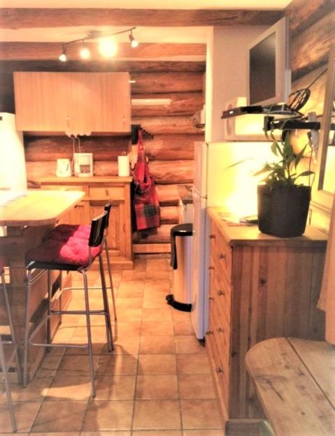 Kuchyň nebo kuchyňský kout v ubytování Chalet Le Ranch