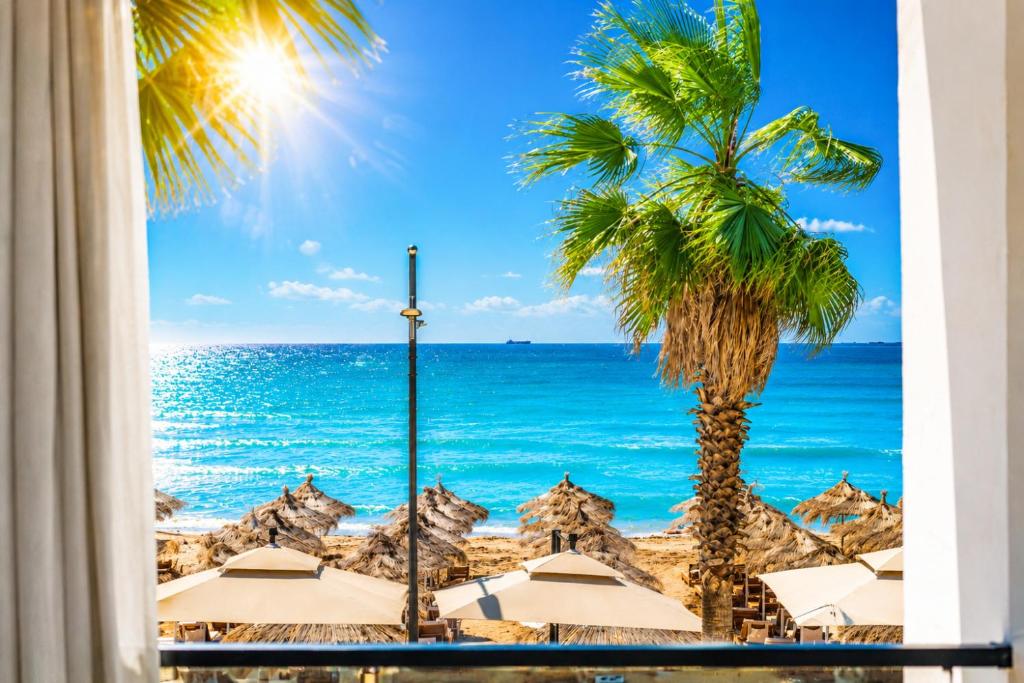 a view of the ocean from a hotel window at Villa Verona in Durrës