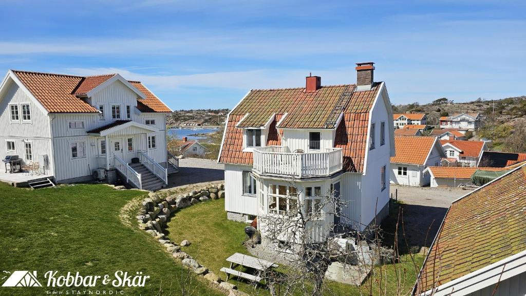 an aerial view of a house with a yard at Charming archipelago house in Grebbestad SE09082 in Grebbestad