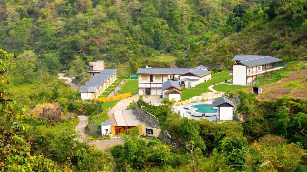 an aerial view of a house on a hill at The JJ Corbett Bliss, Sitabani A River Access Wildlife Resort in Amgarhi