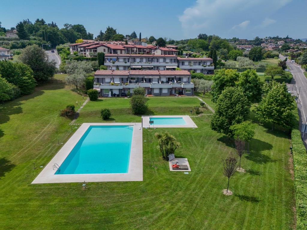 an aerial view of a large estate with two swimming pools at MGH Luxury- Romantic SPA & Relax in Poiano