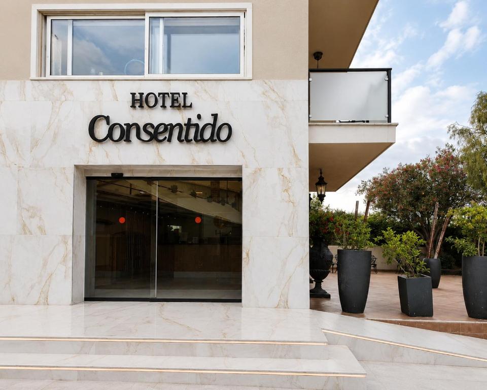 a hotel coronado sign on the side of a building at Hotel Consentido in Granollers