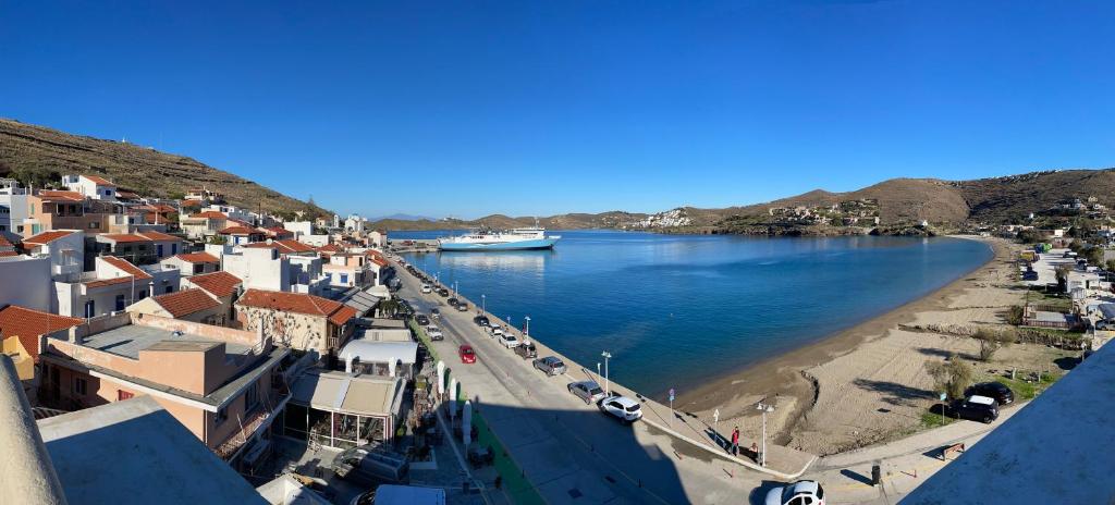 a view of a beach with a boat in the water at Hotel Karthea in Korissia